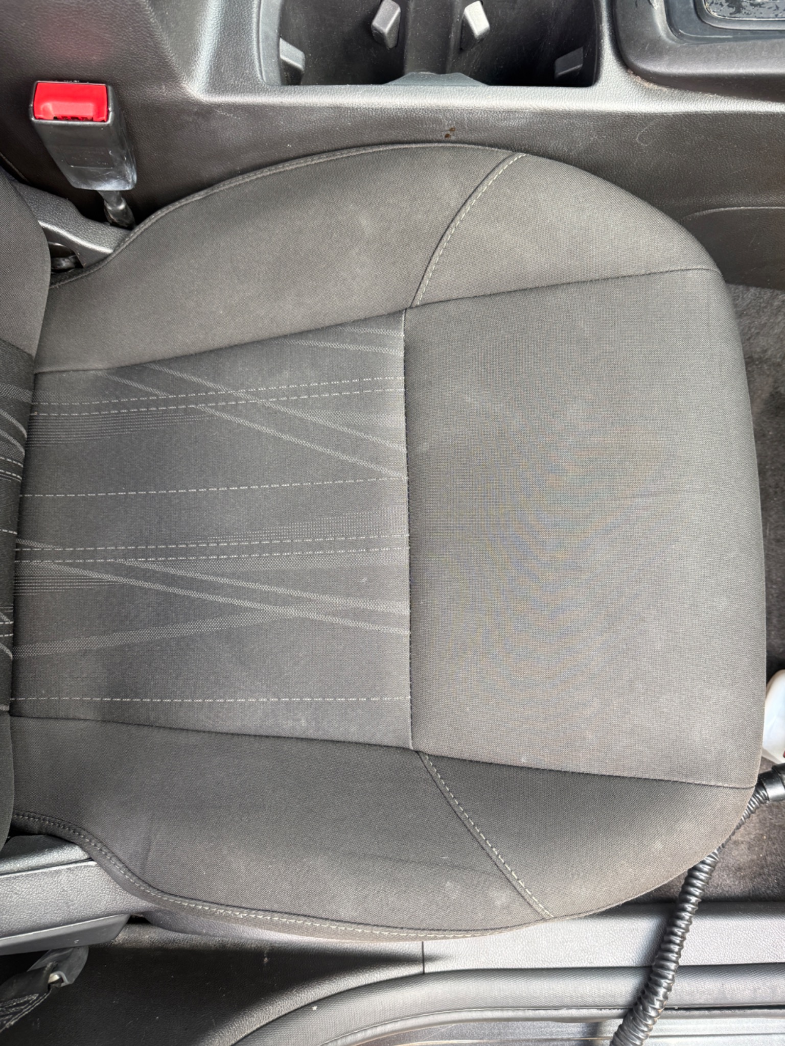 Clean fabric seat after interior detailing