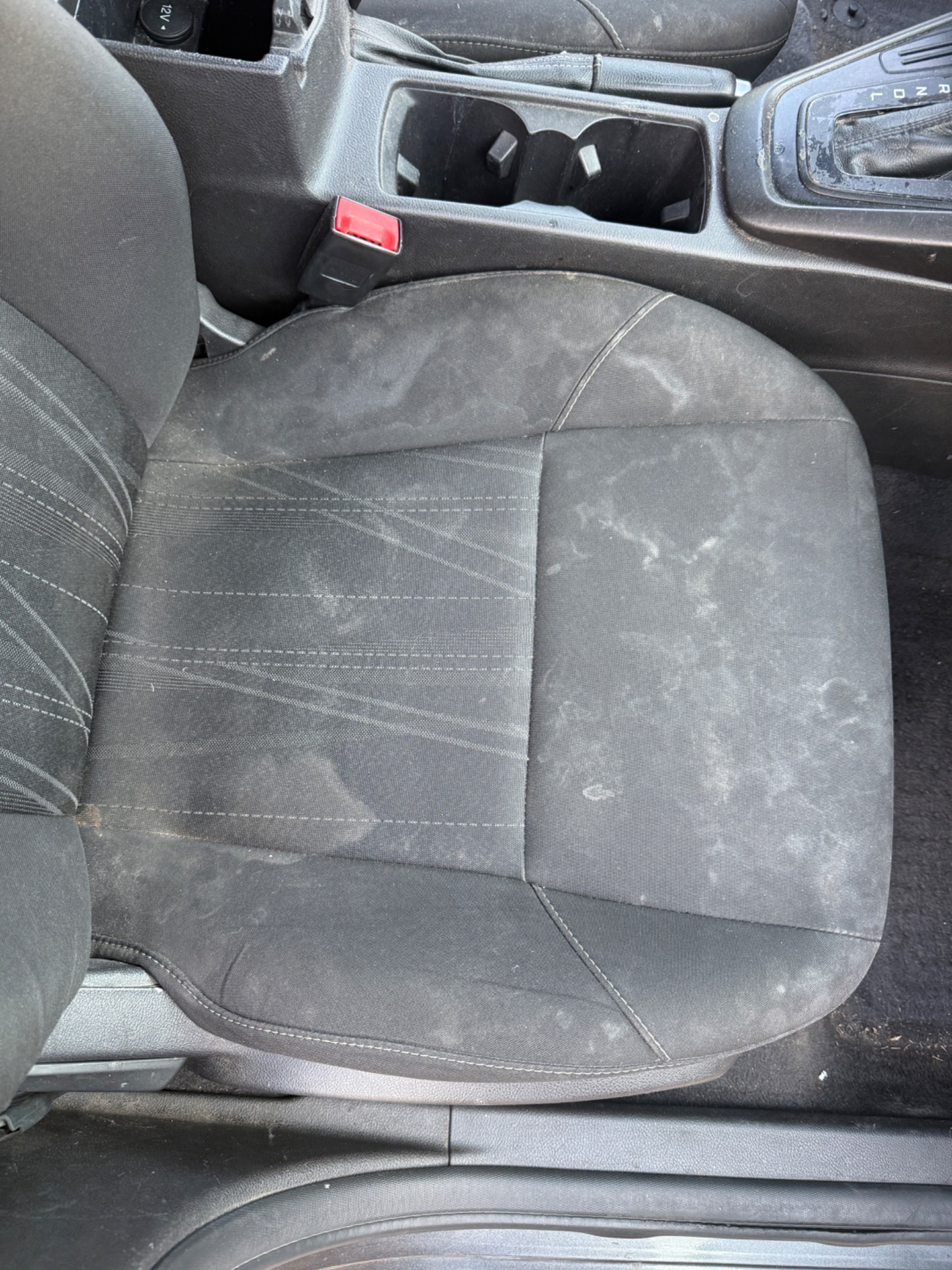 Dirty fabric seat before interior detailing